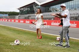 Lewis Hamilton (GBR) Mercedes AMG F1 takes a penalty kick. 03.07.2014. Formula 1 World Championship, Rd 9, British Grand Prix, Silverstone, England, Preparation Day.