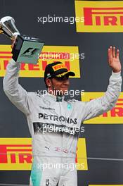 Lewis Hamilton (GBR) Mercedes AMG F1 celebrates his third position on the podium. 27.07.2014. Formula 1 World Championship, Rd 11, Hungarian Grand Prix, Budapest, Hungary, Race Day.