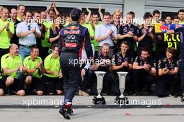 Race winner Daniel Ricciardo (AUS) Red Bull Racing celebrates with the team. 27.07.2014. Formula 1 World Championship, Rd 11, Hungarian Grand Prix, Budapest, Hungary, Race Day.