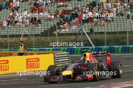Race winner Daniel Ricciardo (AUS) Red Bull Racing RB10 celebrates at the end of the race. 27.07.2014. Formula 1 World Championship, Rd 11, Hungarian Grand Prix, Budapest, Hungary, Race Day.