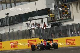 Race winner Daniel Ricciardo (AUS) Red Bull Racing RB10 celebrates as he takes the chequered flag at the end of the race. 27.07.2014. Formula 1 World Championship, Rd 11, Hungarian Grand Prix, Budapest, Hungary, Race Day.