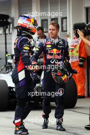 (L to R): Daniel Ricciardo (AUS) Red Bull Racing and team mate Sebastian Vettel (GER) Red Bull Racing in qualifying parc ferme. 26.07.2014. Formula 1 World Championship, Rd 11, Hungarian Grand Prix, Budapest, Hungary, Qualifying Day.