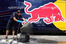 Red Bull Racing mechanics wash Pirelli tyres. 26.07.2014. Formula 1 World Championship, Rd 11, Hungarian Grand Prix, Budapest, Hungary, Qualifying Day.