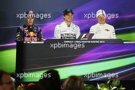 The FIA Press Conference Qualifying top three (L to R): Sebastian Vettel (GER) Red Bull Racing, second; Nico Rosberg (GER) Mercedes AMG F1, pole position; Valtteri Bottas (FIN) Williams, third. 26.07.2014. Formula 1 World Championship, Rd 11, Hungarian Grand Prix, Budapest, Hungary, Qualifying Day.