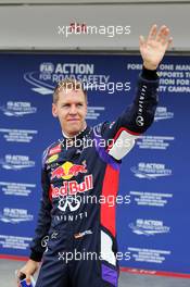 Sebastian Vettel (GER) Red Bull Racing celebrates his second position in qualifying parc ferme. 26.07.2014. Formula 1 World Championship, Rd 11, Hungarian Grand Prix, Budapest, Hungary, Qualifying Day.