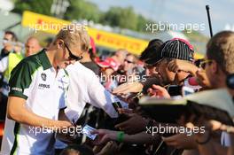 Marcus Ericsson (SWE) Caterham signs autographs for the fans. 24.07.2014. Formula 1 World Championship, Rd 11, Hungarian Grand Prix, Budapest, Hungary, Preparation Day.
