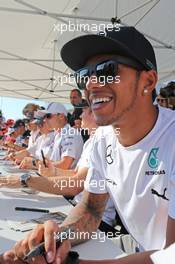 Lewis Hamilton (GBR) Mercedes AMG F1 signs autographs for the fans. 24.07.2014. Formula 1 World Championship, Rd 11, Hungarian Grand Prix, Budapest, Hungary, Preparation Day.