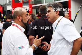 (L to R): Ivan Capelli (ITA) President of ACI Milano with Pasquale Lattuneddu (ITA) of the FOM. 05.09.2014. Formula 1 World Championship, Rd 13, Italian Grand Prix, Monza, Italy, Practice Day.