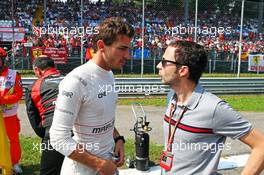 Jules Bianchi (FRA) Marussia F1 Team with Nicolas Todt (FRA) Driver Manager on the grid. 07.09.2014. Formula 1 World Championship, Rd 13, Italian Grand Prix, Monza, Italy, Race Day.