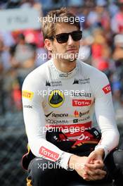Romain Grosjean (FRA) Lotus F1 Team on the grid. 07.09.2014. Formula 1 World Championship, Rd 13, Italian Grand Prix, Monza, Italy, Race Day.