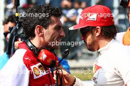Fernando Alonso (ESP) Ferrari with Andrea Stella (ITA) Ferrari Race Engineer on the grid. 07.09.2014. Formula 1 World Championship, Rd 13, Italian Grand Prix, Monza, Italy, Race Day.
