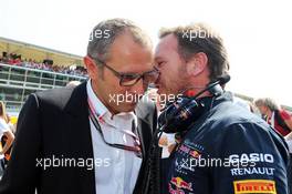 (L to R): Stefano Domenicali (ITA) with Christian Horner (GBR) Red Bull Racing Team Principal on the grid. 07.09.2014. Formula 1 World Championship, Rd 13, Italian Grand Prix, Monza, Italy, Race Day.