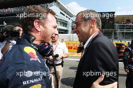 (L to R): Christian Horner (GBR) Red Bull Racing Team Principal with Stefano Domenicali (ITA) on the grid. 07.09.2014. Formula 1 World Championship, Rd 13, Italian Grand Prix, Monza, Italy, Race Day.