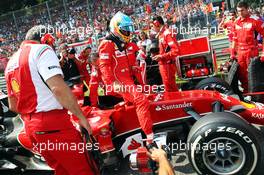 Fernando Alonso (ESP) Ferrari F14-T on the grid. 07.09.2014. Formula 1 World Championship, Rd 13, Italian Grand Prix, Monza, Italy, Race Day.