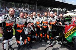 The Sahara Force India F1 Team pay tribute to Sahara Force India F1 Team Mechanic Gary North (GBR), known as 'Gadget', on the grid. 07.09.2014. Formula 1 World Championship, Rd 13, Italian Grand Prix, Monza, Italy, Race Day.