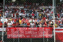 Fans and a banner. 07.09.2014. Formula 1 World Championship, Rd 13, Italian Grand Prix, Monza, Italy, Race Day.