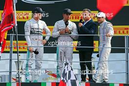 The podium (L to R): Nico Rosberg (GER) Mercedes AMG F1, second; Lewis Hamilton (GBR) Mercedes AMG F1, race winner; Jean Alesi (FRA); Felipe Massa (BRA) Williams, third. 07.09.2014. Formula 1 World Championship, Rd 13, Italian Grand Prix, Monza, Italy, Race Day.