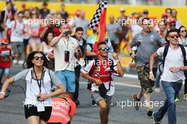Fans invade the circuit after the end of the race. 07.09.2014. Formula 1 World Championship, Rd 13, Italian Grand Prix, Monza, Italy, Race Day.