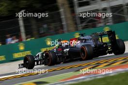 Sergio Perez (MEX) Sahara Force India F1 VJM07 and Jenson Button (GBR) McLaren MP4-29 battle for position. 07.09.2014. Formula 1 World Championship, Rd 13, Italian Grand Prix, Monza, Italy, Race Day.