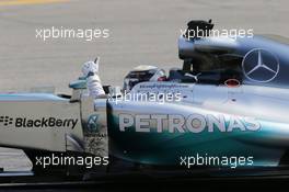 Race winner Lewis Hamilton (GBR) Mercedes AMG F1 W05 celebrates at the end of the race. 07.09.2014. Formula 1 World Championship, Rd 13, Italian Grand Prix, Monza, Italy, Race Day.