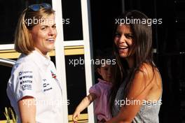 (L to R): Susie Wolff (GBR) Williams Development Driver with Gabriele Tarkanyi, wife of Pastor Maldonado (VEN) Lotus F1 Team, and their daughter Victoria. 06.09.2014. Formula 1 World Championship, Rd 13, Italian Grand Prix, Monza, Italy, Qualifying Day.