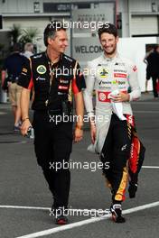 Romain Grosjean (FRA) Lotus F1 Team (Right). 03.10.2014. Formula 1 World Championship, Rd 15, Japanese Grand Prix, Suzuka, Japan, Practice Day.