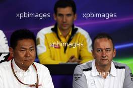 (L to R): Yasuhisa Arai (JPN) Honda Motorsport Chief Officer with Jonathan Neale (GBR) McLaren Chief Operating Officer in the FIA Press Conference. 03.10.2014. Formula 1 World Championship, Rd 15, Japanese Grand Prix, Suzuka, Japan, Practice Day.