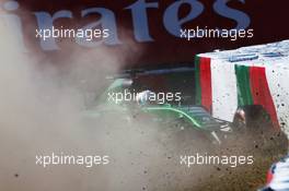Kamui Kobayashi (JPN) Caterham CT05 loses control and crashes in the second practice session. 03.10.2014. Formula 1 World Championship, Rd 15, Japanese Grand Prix, Suzuka, Japan, Practice Day.