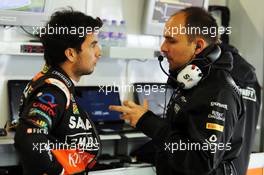 (L to R): Sergio Perez (MEX) Sahara Force India F1 with Gianpiero Lambiase (ITA) Sahara Force India F1 Engineer. 05.10.2014. Formula 1 World Championship, Rd 15, Japanese Grand Prix, Suzuka, Japan, Race Day.