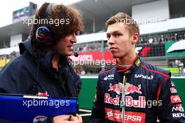 Daniil Kvyat (RUS) Scuderia Toro Rosso with Marco Matassa (ITA) Scuderia Toro Rosso Race Engineer (Left) on the grid. 05.10.2014. Formula 1 World Championship, Rd 15, Japanese Grand Prix, Suzuka, Japan, Race Day.