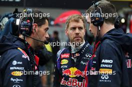 Sebastian Vettel (GER) Red Bull Racing on the grid. 05.10.2014. Formula 1 World Championship, Rd 15, Japanese Grand Prix, Suzuka, Japan, Race Day.