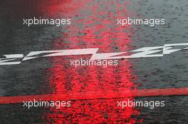 Red light on a wet grid. 05.10.2014. Formula 1 World Championship, Rd 15, Japanese Grand Prix, Suzuka, Japan, Race Day.