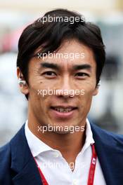 Takuma Sato (JPN) on the grid. 05.10.2014. Formula 1 World Championship, Rd 15, Japanese Grand Prix, Suzuka, Japan, Race Day.