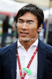 Takuma Sato (JPN) on the grid. 05.10.2014. Formula 1 World Championship, Rd 15, Japanese Grand Prix, Suzuka, Japan, Race Day.