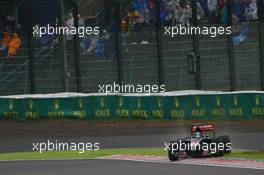 Jean-Eric Vergne (FRA) Scuderia Toro Rosso STR9 runs wide. 05.10.2014. Formula 1 World Championship, Rd 15, Japanese Grand Prix, Suzuka, Japan, Race Day.
