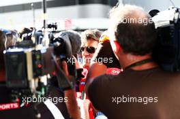 Graeme Lowdon (GBR) Marussia F1 Team Chief Executive Officer with the media. 10.10.2014. Formula 1 World Championship, Rd 16, Russian Grand Prix, Sochi Autodrom, Sochi, Russia, Practice Day.