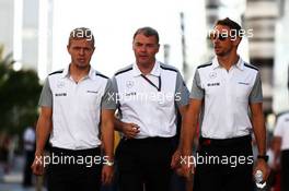 (L to R): Kevin Magnussen (DEN) McLaren with Dave Redding (GBR) McLaren Sporting Director and Jenson Button (GBR) McLaren. 10.10.2014. Formula 1 World Championship, Rd 16, Russian Grand Prix, Sochi Autodrom, Sochi, Russia, Practice Day.