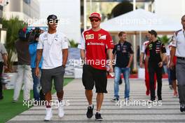 (L to R): Lewis Hamilton (GBR) Mercedes AMG F1 with Kimi Raikkonen (FIN) Ferrari. 10.10.2014. Formula 1 World Championship, Rd 16, Russian Grand Prix, Sochi Autodrom, Sochi, Russia, Practice Day.