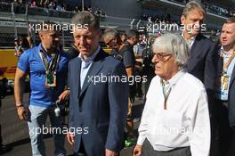 (L to R): Dmitry Kozak (RUS) Russian Deputy Prime Minister with Bernie Ecclestone (GBR) on the grid. 12.10.2014. Formula 1 World Championship, Rd 16, Russian Grand Prix, Sochi Autodrom, Sochi, Russia, Race Day.