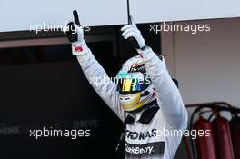 Race winner Lewis Hamilton (GBR) Mercedes AMG F1 celebrates in parc ferme. 12.10.2014. Formula 1 World Championship, Rd 16, Russian Grand Prix, Sochi Autodrom, Sochi, Russia, Race Day.