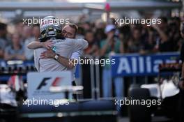Race winner Lewis Hamilton (GBR) Mercedes AMG F1 celebrates in parc ferme with Paddy Lowe (GBR) Mercedes AMG F1 Executive Director (Technical). 12.10.2014. Formula 1 World Championship, Rd 16, Russian Grand Prix, Sochi Autodrom, Sochi, Russia, Race Day.