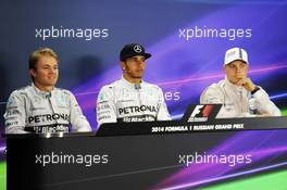 The post race FIA Press Conference (L to R): Nico Rosberg (GER) Mercedes AMG F1, second; Lewis Hamilton (GBR) Mercedes AMG F1, race winner; Valtteri Bottas (FIN) Williams, third. 12.10.2014. Formula 1 World Championship, Rd 16, Russian Grand Prix, Sochi Autodrom, Sochi, Russia, Race Day.