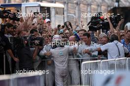 Race winner Lewis Hamilton (GBR) Mercedes AMG F1 celebrates with the team in parc ferme. 12.10.2014. Formula 1 World Championship, Rd 16, Russian Grand Prix, Sochi Autodrom, Sochi, Russia, Race Day.
