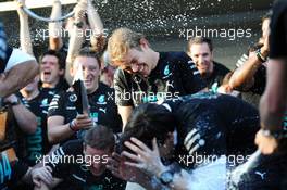 Nico Rosberg (GER) Mercedes AMG F1 celebrates winning the 2014 Constructors' Championship with the team. 12.10.2014. Formula 1 World Championship, Rd 16, Russian Grand Prix, Sochi Autodrom, Sochi, Russia, Race Day.