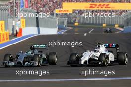Nico Rosberg (GER), Mercedes AMG F1 Team and Valtteri Bottas (FIN), Williams F1 Team  12.10.2014. Formula 1 World Championship, Rd 16, Russian Grand Prix, Sochi Autodrom, Sochi, Russia, Race Day.