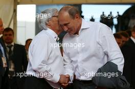 (L to R): Bernie Ecclestone (GBR) with Vladimir Putin (RUS) Russian President. 12.10.2014. Formula 1 World Championship, Rd 16, Russian Grand Prix, Sochi Autodrom, Sochi, Russia, Race Day.