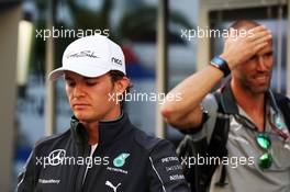 (L to R): Nico Rosberg (GER) Mercedes AMG F1 with Daniel Schloesser (GER) Mercedes AMG F1 Physio. 09.10.2014. Formula 1 World Championship, Rd 16, Russian Grand Prix, Sochi Autodrom, Sochi, Russia, Preparation Day.