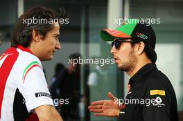 (L to R): Massimo Rivola (ITA) Ferrari Sporting Director with Sergio Perez (MEX) Sahara Force India F1. 09.10.2014. Formula 1 World Championship, Rd 16, Russian Grand Prix, Sochi Autodrom, Sochi, Russia, Preparation Day.