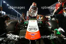 Jules Bianchi (FRA) Marussia F1 Team MR03 on the grid. 21.09.2014. Formula 1 World Championship, Rd 14, Singapore Grand Prix, Singapore, Singapore, Race Day.