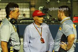 (L to R): Mario Isola (ITA) Pirelli Racing Manager with Niki Lauda (AUT) Mercedes Non-Executive Chairman and Paul Hembery (GBR) Pirelli Motorsport Director. 21.09.2014. Formula 1 World Championship, Rd 14, Singapore Grand Prix, Singapore, Singapore, Race Day.